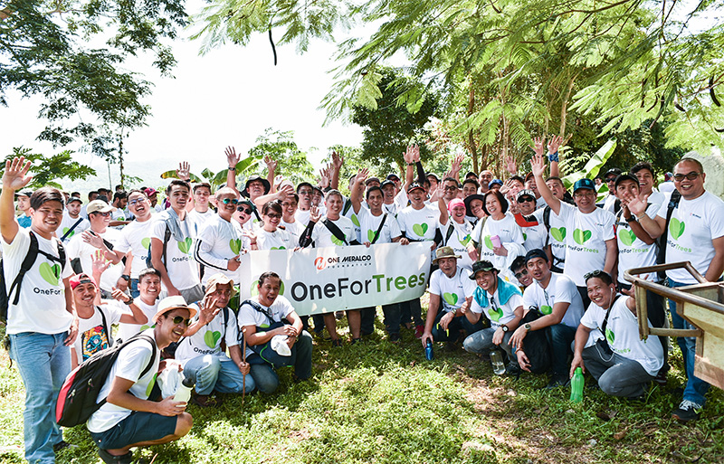 Meralco Employees attending a tree planting activity