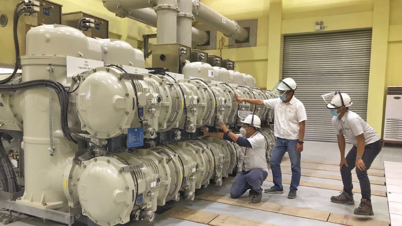 Meralco engineers inspect heavy equipment