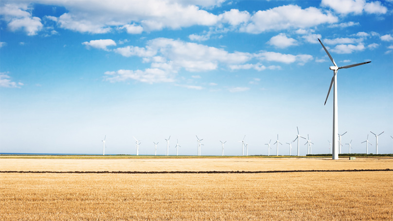 Wind turbine in an open field