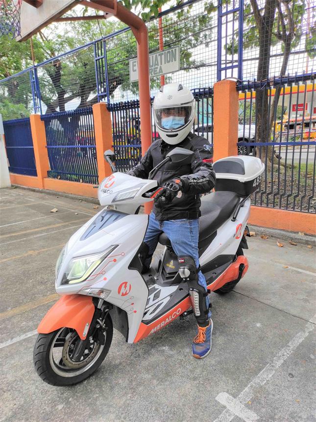 Rider on a Meralco motorcycle